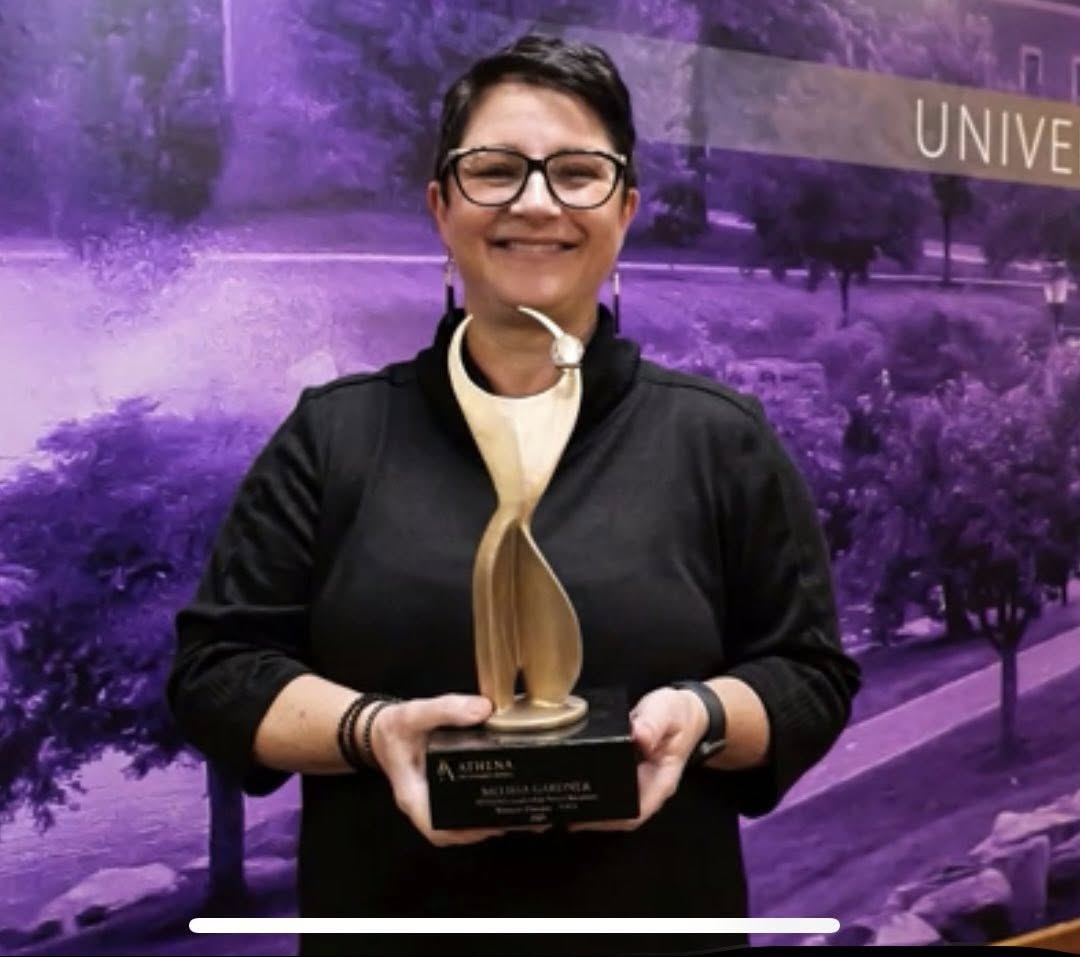 gardner holding athena award
