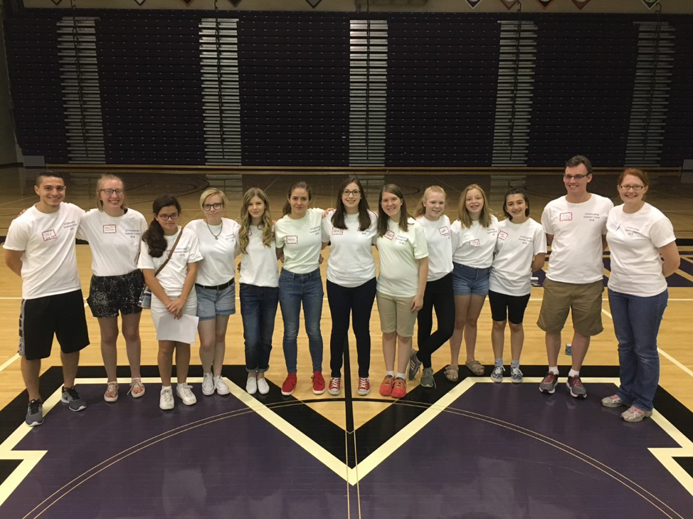 Stemcoding participants take a group photo with faculty and student volunteers.