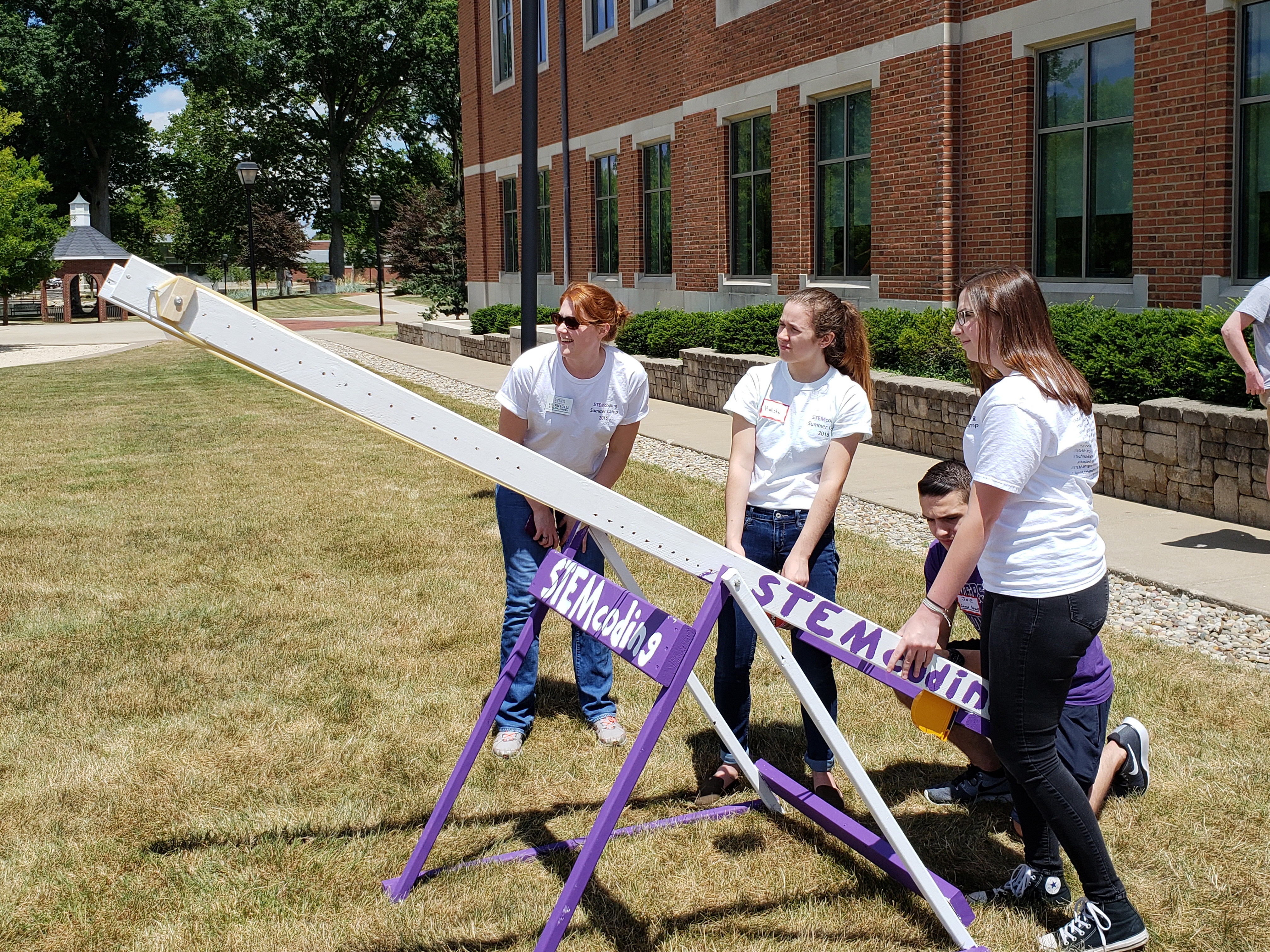 Stemcoding students participate in an experiment with Mount Union faculty member.