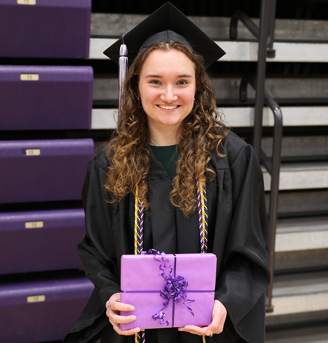 Krizner posing with award