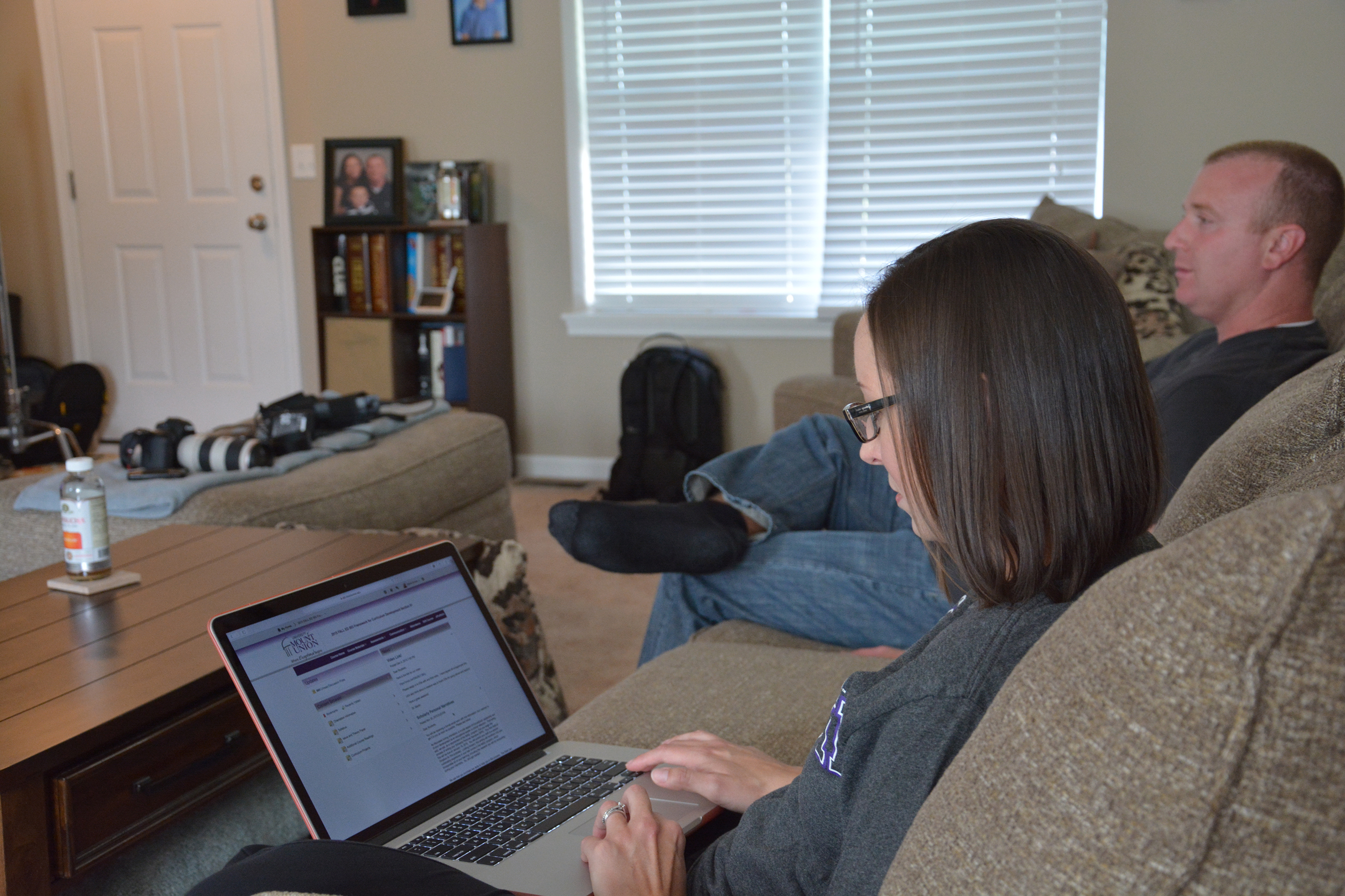 female student on computer at home