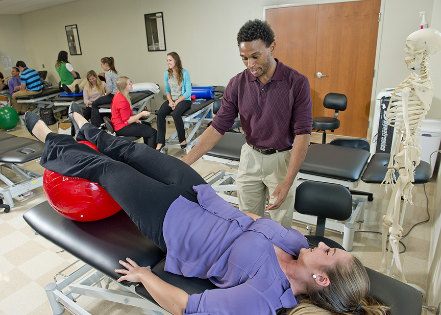 two pt students in lab