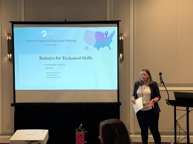 Kelly Dallas presenting at conference