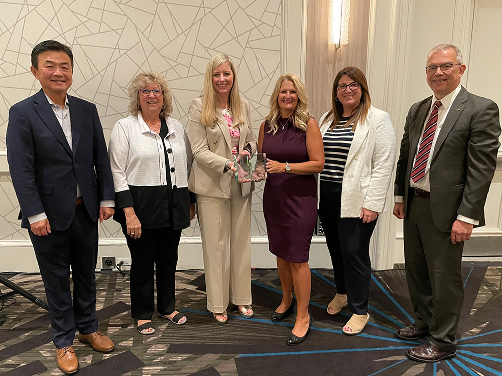 group being presented award