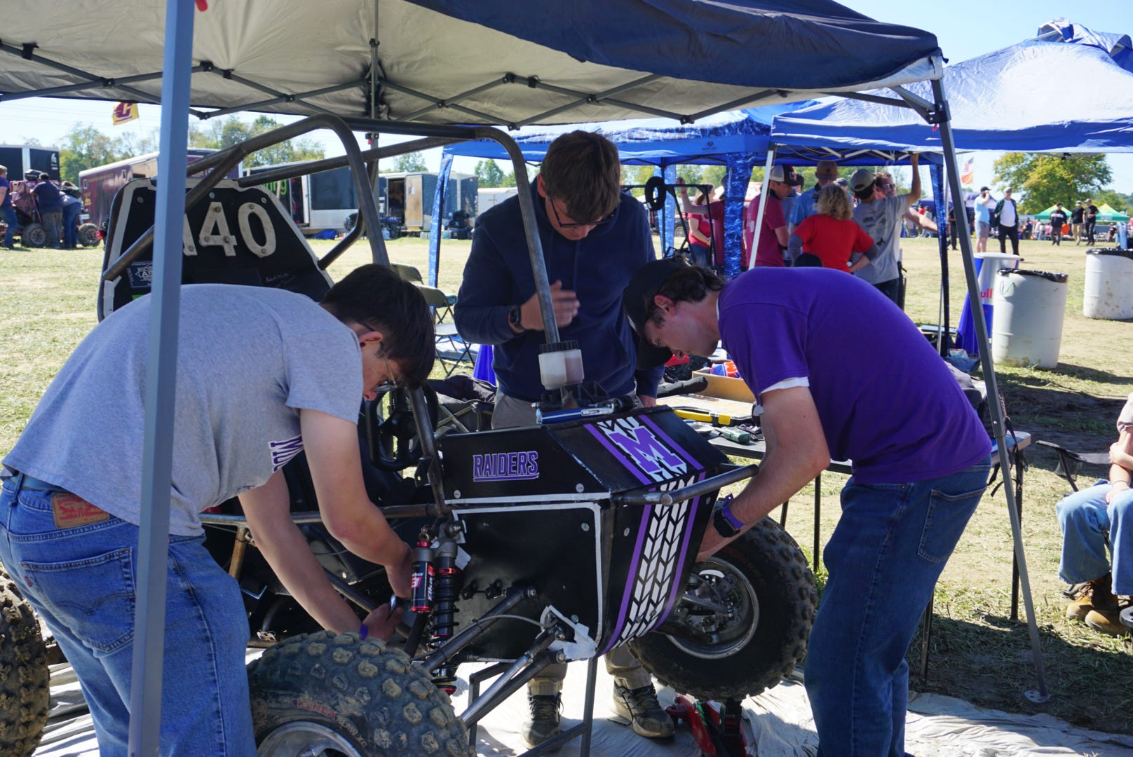 Baja team working on the car