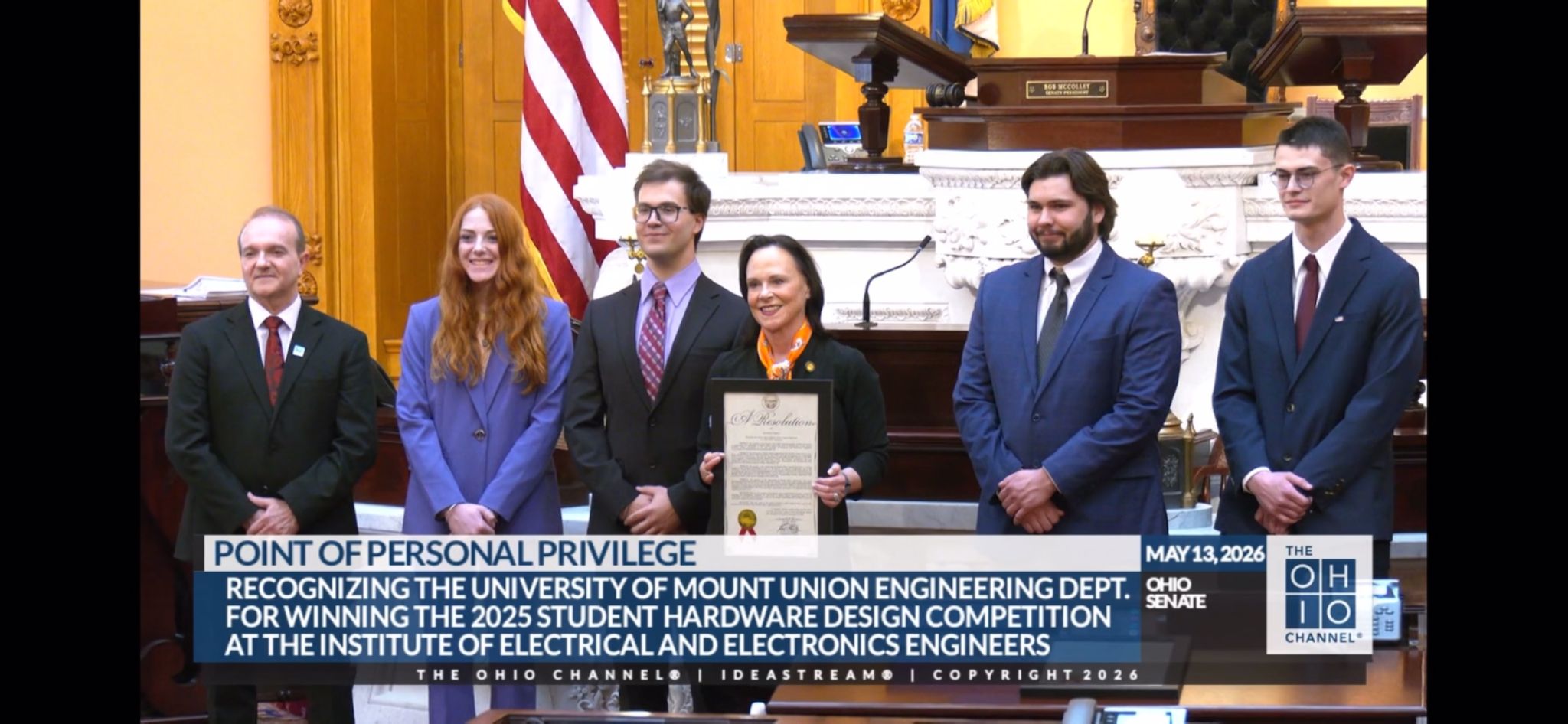 Students and faculty posing with senator Jane Timken