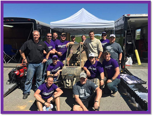 Mount Union's BAJA Racing Team posing around car