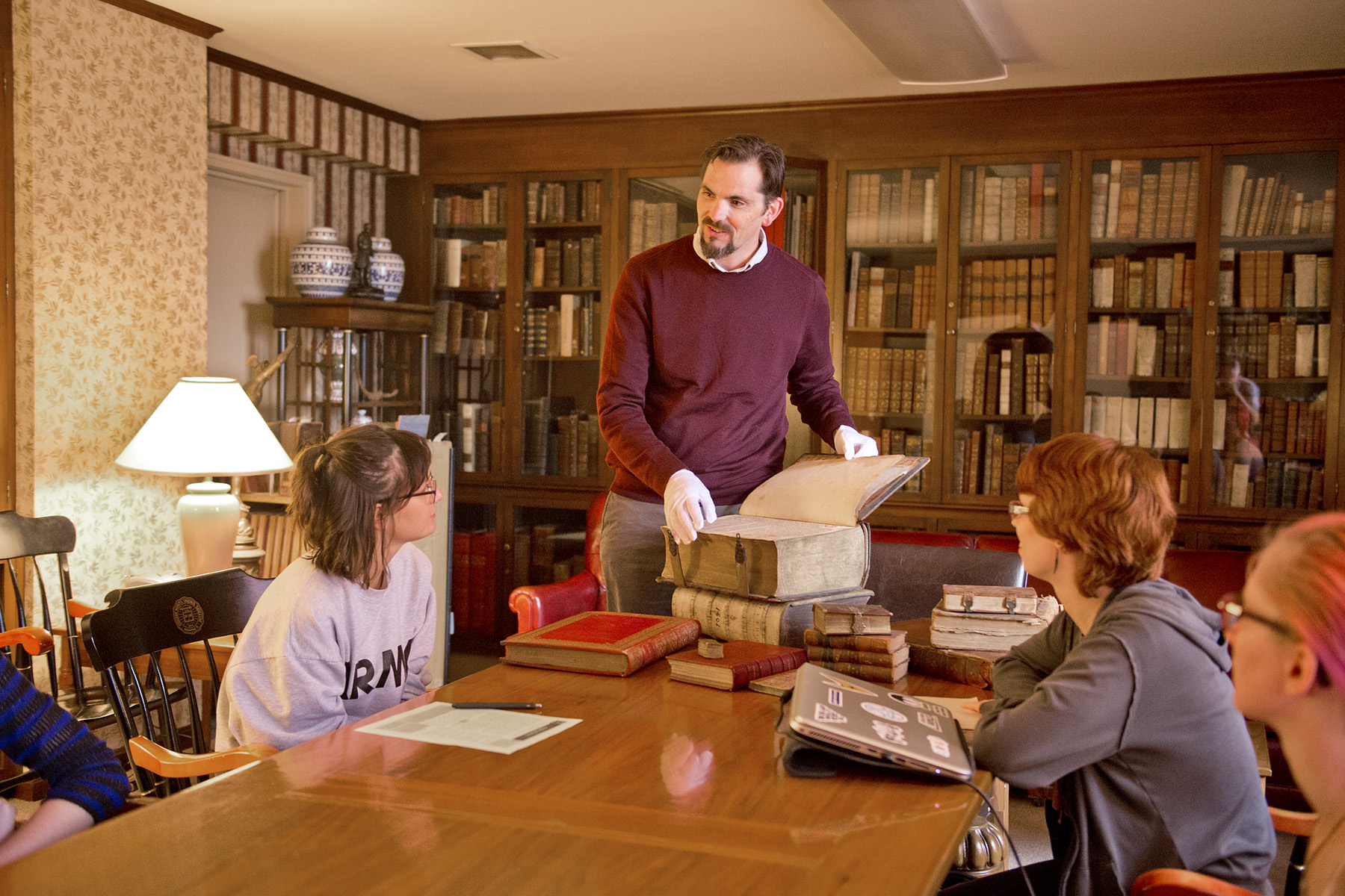 David Thiele presenting a book to students