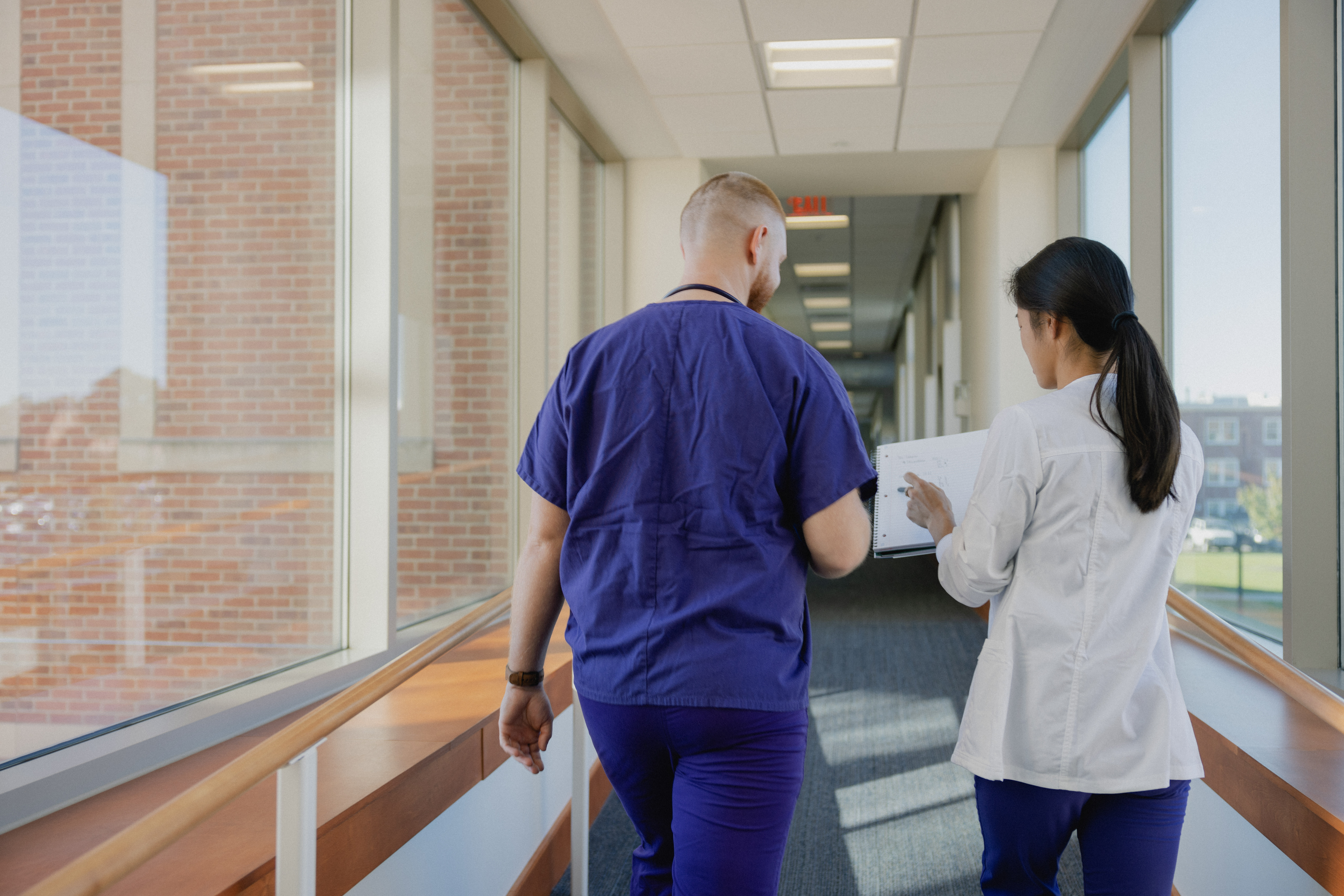 mount union nurses walking down hallway