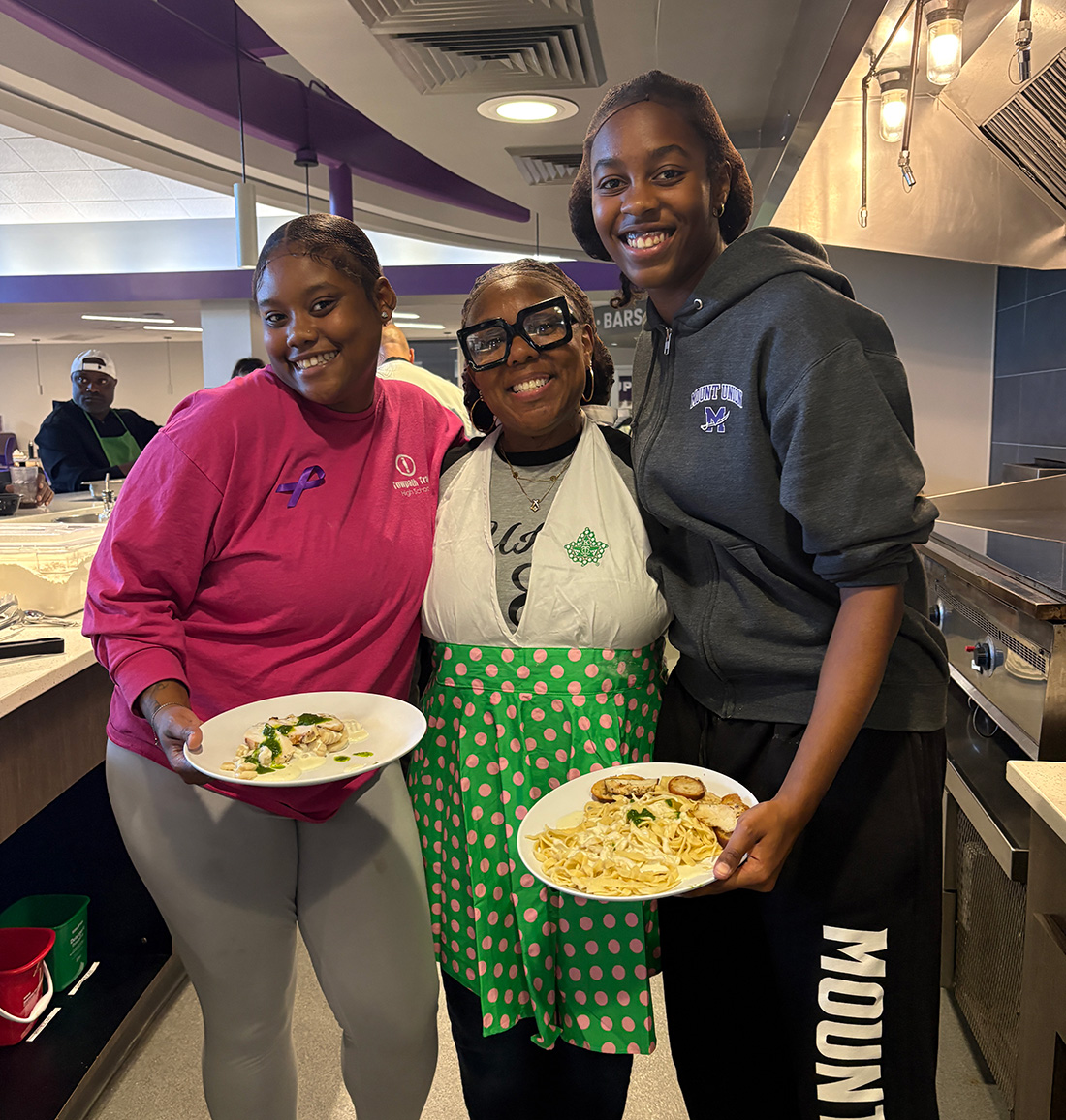 Students posing with their homemade pasta