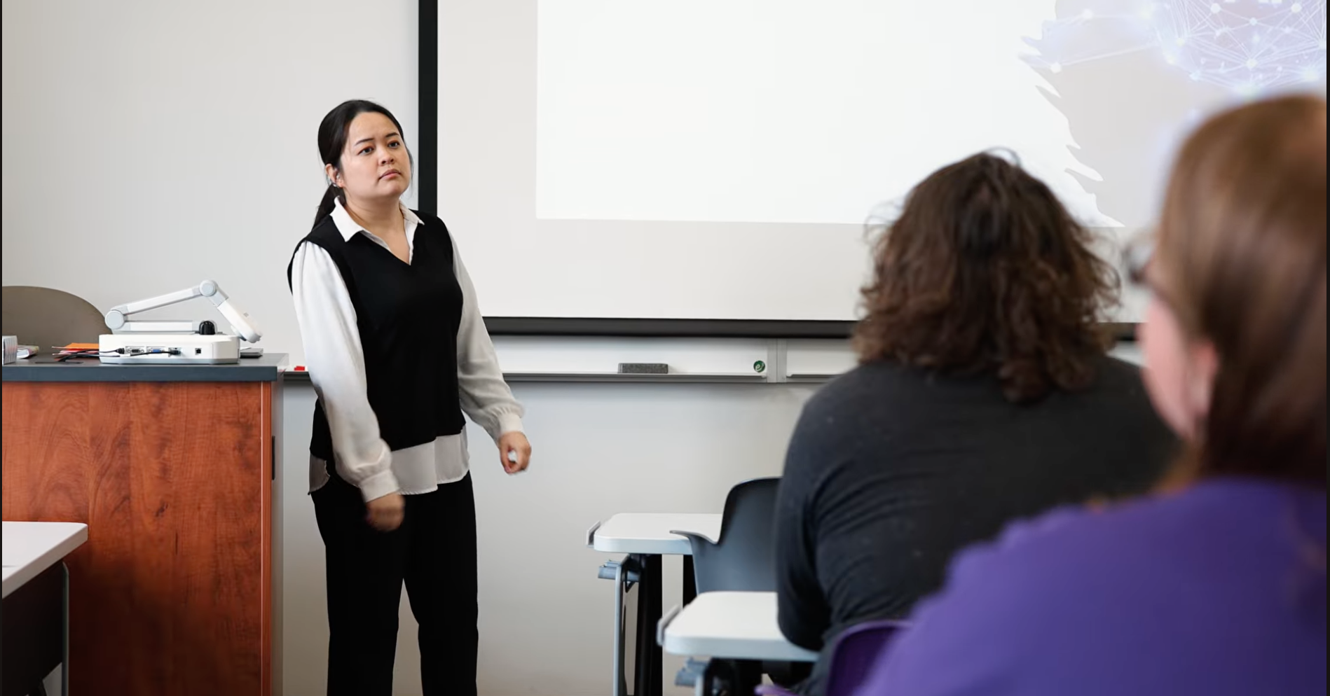 ogawa teaching in front of class