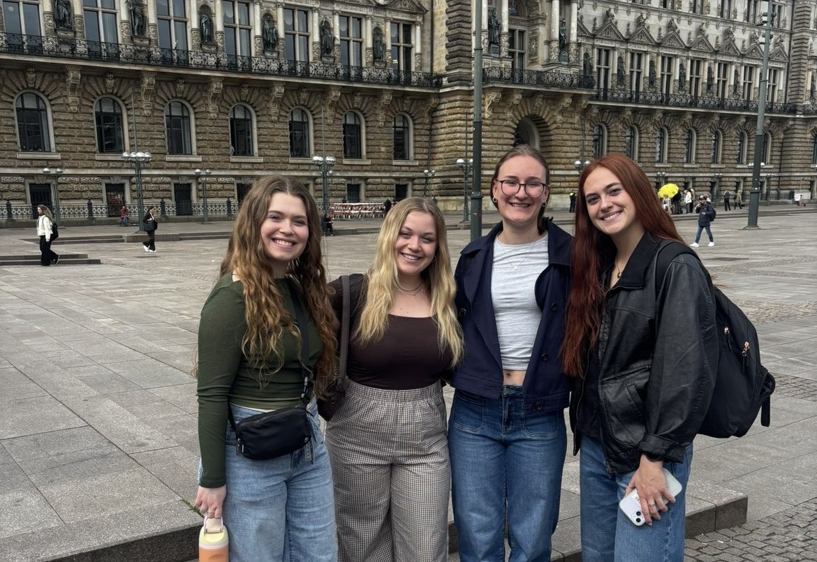 Brass (second on the left) and McElwee (far right) with other students