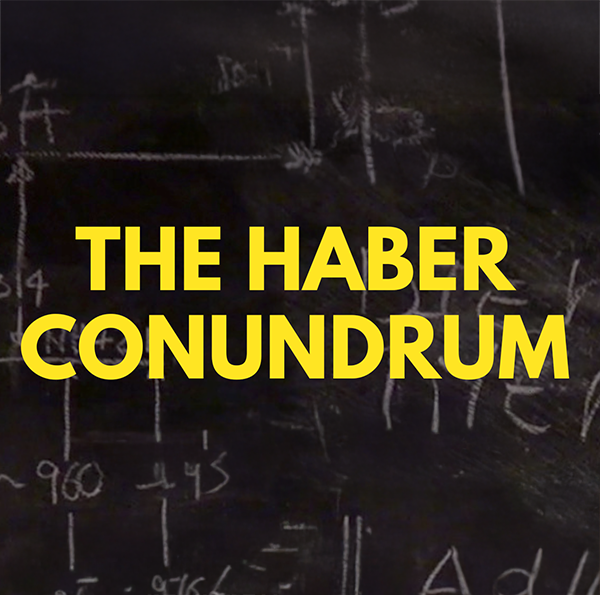 The Haber Conundrum in Yellow in front of a chalk board