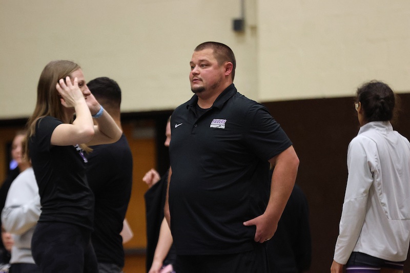 Hanrahan '28 (left) with wrestling coach, Wenger (right)