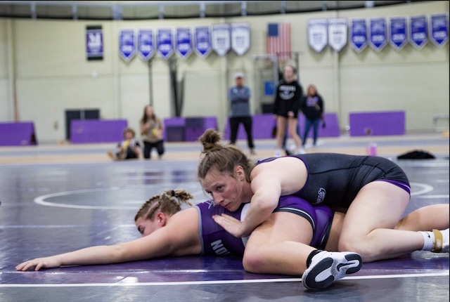 Hanrahan '28 (top) at a wrestling match