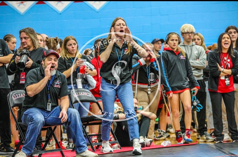 Hanrahan '28 (front) coaching at AHS