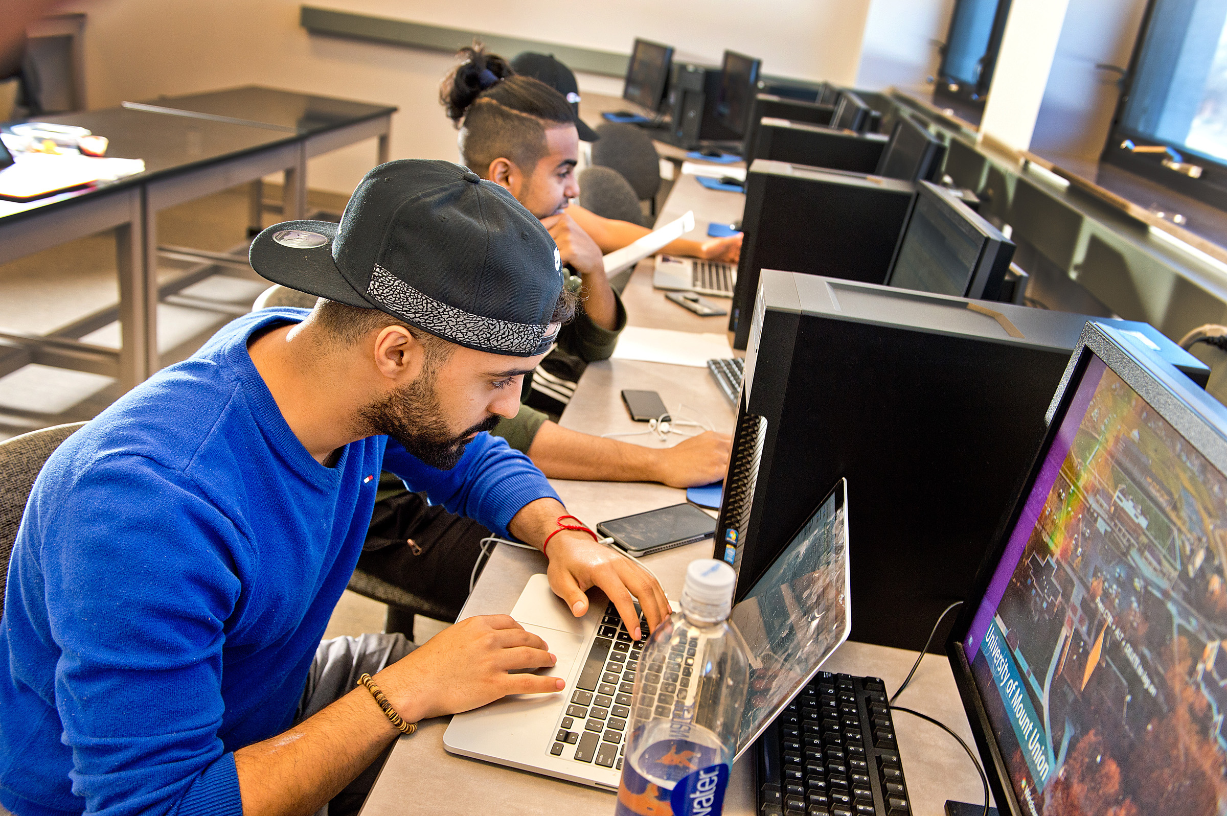 students doing work on computers