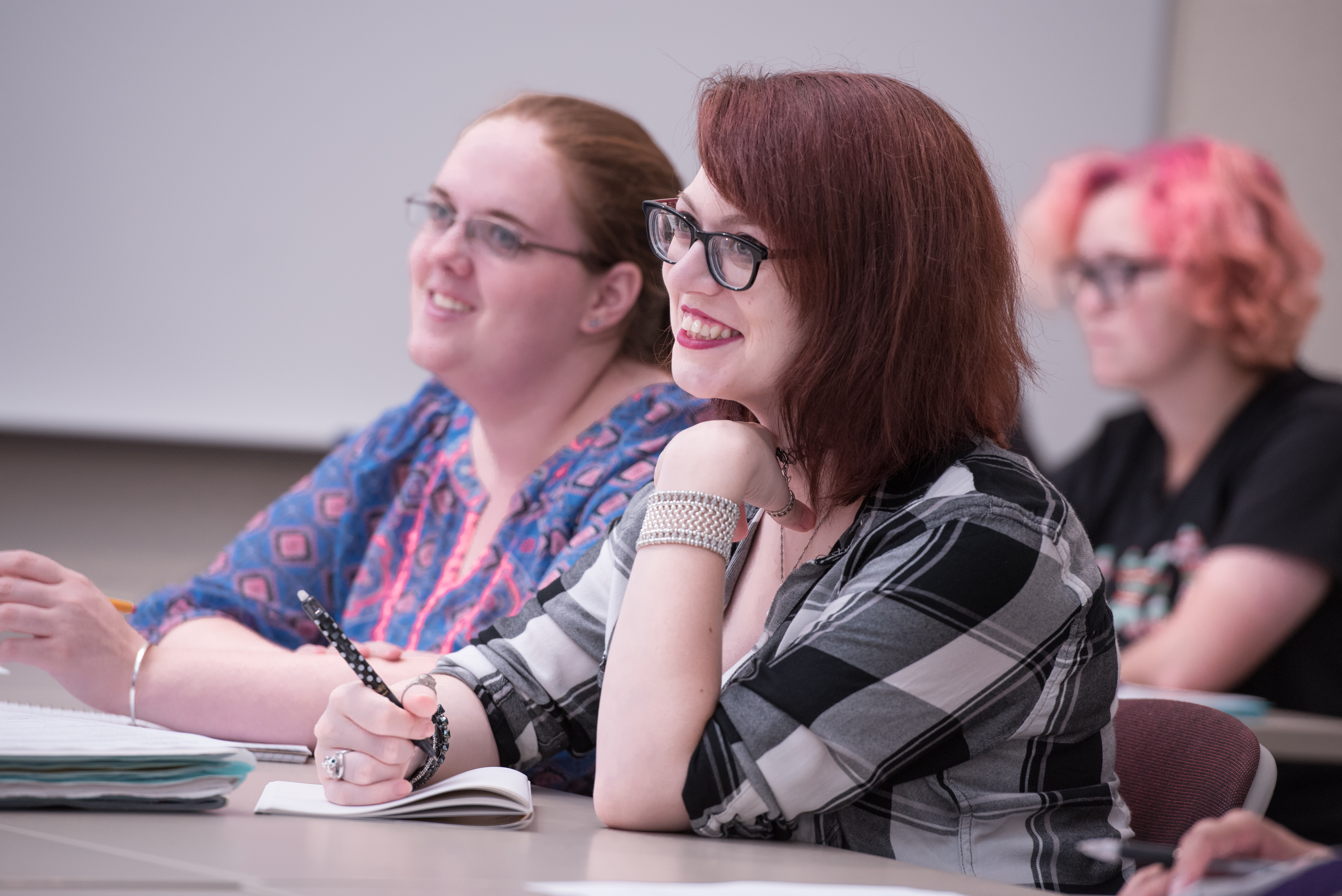 student smiling in class