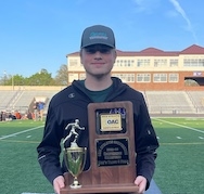 Joey Valeri '25 holding a trophy